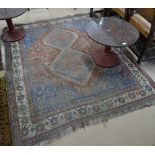 An Antique red ground Beluchi rug, 200cm x 166cm