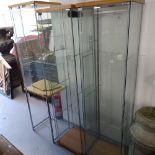 A pair of square glass-framed display cabinets, W42cm each, and another (3)