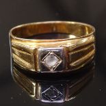 An 18ct gold and diamond set signet ring, 3.3g, size M