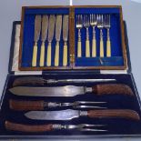 A Joseph Rogers & Sons 5-piece horn-handled carving set, with silver collars, in fitted case, and