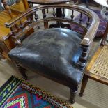 A Victorian mahogany bow armchair, with studded leather seat