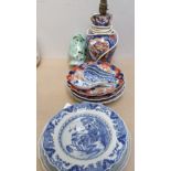 A Chinese blue and white plate with shaped edge, 22cm, Imari plates and lamp etc