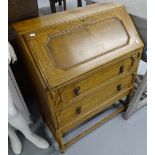 1920s light oak 2-drawer bureau on barley twist legs, W76cm