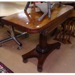 A William IV mahogany fold over card table, on a tapered centre column and platform base, W91cm