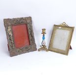 A 19th century hand painted porcelain and brass candlestick, a brass-framed photo frame, and a