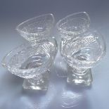 A set of 4 Georgian cut-glass pedestal salts, length 10cm