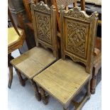 A pair of Bretton carved and panelled-back hall chairs