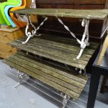 A hardwood slatted top garden table on scrolled metal base, and a pair of matching benches
