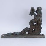 A large Oriental cast-bronze verdigris water dragon wall bracket, bracket height 44cm