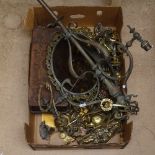 A collection of various brass door knobs, a large brass 3-branch candelabra etc