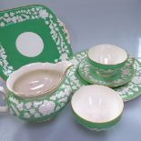 Early 20th century George Jones "Rhapsody" pattern tea service, with moulded floral decoration on