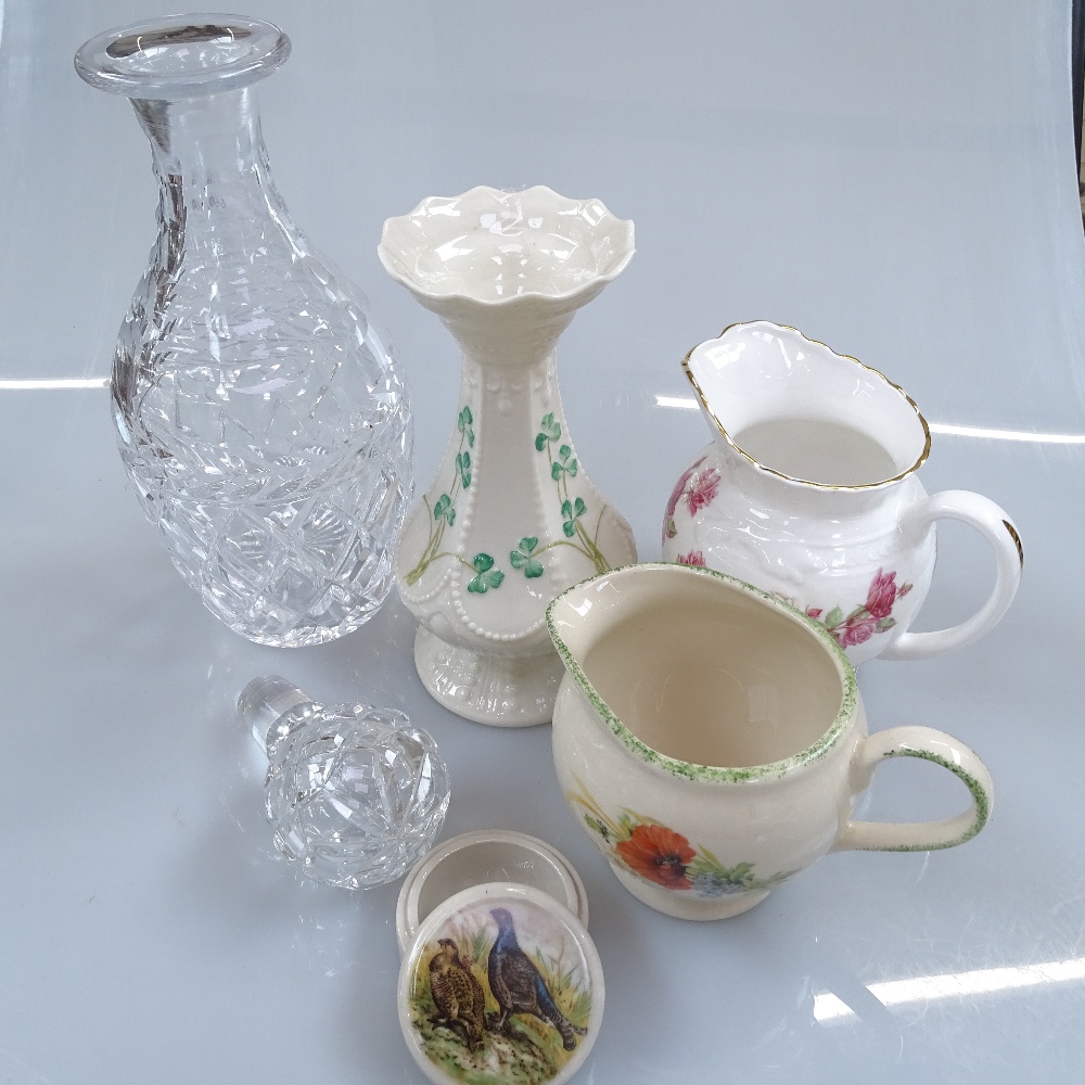 Aynsley jugs, a Belleek vase, and a pair of cut-crystal decanters and stoppers, 23cm, and 5 others