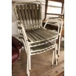 A set of 4 Vintage white painted and hardwood slatted garden armchairs