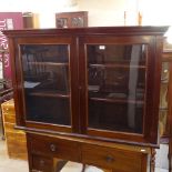 A Victorian mahogany bookcase top, with 2 glazed doors, W127cm