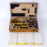 A Carl Zeiss Jena brass microscope and spare lenses, serial no. 22332, cased with various modern