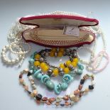 A large quantity of mixed costume jewellery, to include stone set necklaces, beads etc