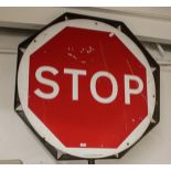 A metal-framed stop/go board