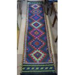 A Suzni Kilim runner, 226cm x 57cm