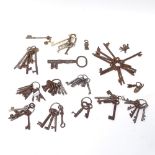 A collection of various Antique and modern keys