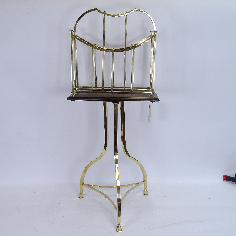 A Victorian Hall BM (Birmingham) brass and oak revolving Canterbury/magazine rack, stamped 1699,