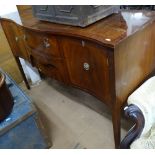 A reproduction crossbanded mahogany serpentine-front sideboard, W140cm