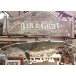 A large handmade carved and painted wood Whale Watchers Society Bar and Grill hanging sign, by Clive