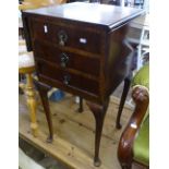 A 1930s walnut drop leaf 3-drawer bedside chest, W38cm