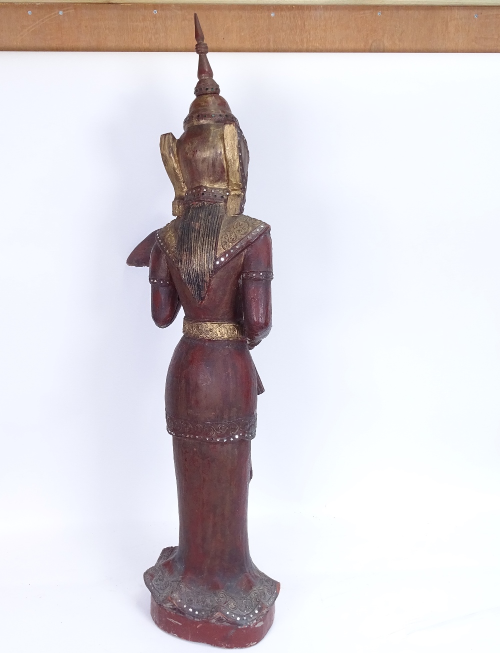 A large Burmese carved lacquered and gilded wood Nat figure on plinth, overall height 93cm - Image 2 of 2