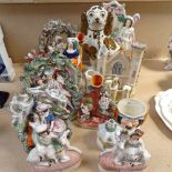 An Edwardian Staffordshire mantel Spaniel 21cm, Victorian and other bocage groups, figures etc