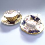 A Coalport cabinet cup and saucer with painted and gilded decoration, and a Copeland & Garrett cup
