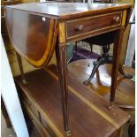 A 19th century mahogany and satinwood-banded butterfly wing Pembroke table, with end frieze