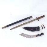 A First War Period military issue bayonet and scabbard, and an Indian kukri knife and scabbard (2)