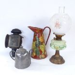 A James Dixon Sheffield plate self-pouring teapot, a 19th century oil carriage lantern, an oil lamp,