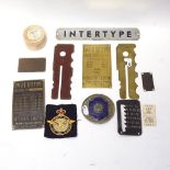 2 military button sticks, and a collection of Intertype metal machine plaques