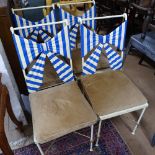 A set of 4 Italian wrought-iron chairs, with painted steel bow decoration
