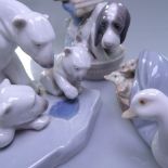 Lladro study of polar bears, duck and ducklings, and girl bathing a dog, height 12cm