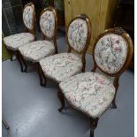 A set of 4 19th century walnut dining chairs, with button-back upholstery, on cabriole legs