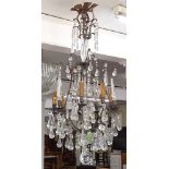 A Continental 9-branch chandelier, with glass tear-drops, L100cm