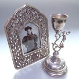 An Islamic design silver photo frame, with scrolled and pierced decoration, and a stylised silver