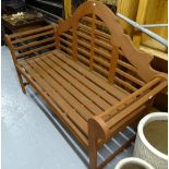 A Lutyens style slatted garden bench, L154cm