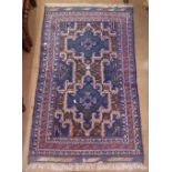 A blue ground Beluchi rug, with symmetrical pattern, 140cm x 80cm