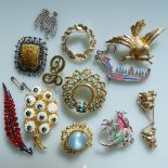 A large quantity of mixed costume jewellery, a jewellery box, brooches, hip flask etc