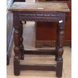 An 18th century oak joint stool, with carved frieze, W45cm