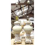 A pair of Continental porcelain table lamps with gilded decoration, overall height 60cm
