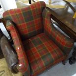 An Edwardian tartan-upholstered armchair