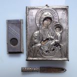 A Russian white metal-fronted icon, a silver dagger design page marker, and a .925 silver cigar