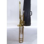 An Embassy by Besson gold lacquered 3-valve trombone, serial no. 4224, length 109cm, with leather