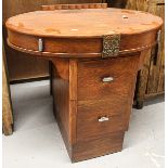 An unusual oak side table, with oval top and 2 central drawers, W76cm