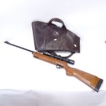 A BSA Meteor air rifle, with Apollo 3-9 x 40 telescopic sight, overall length 105cm, with protective
