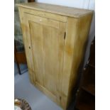 An Antique pine larder cupboard with single panel door, W85cm